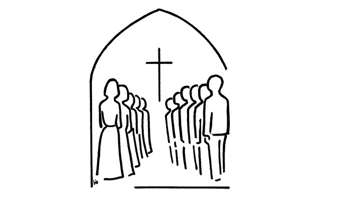 En gruppe af mennesker står i en kirke under et kors.