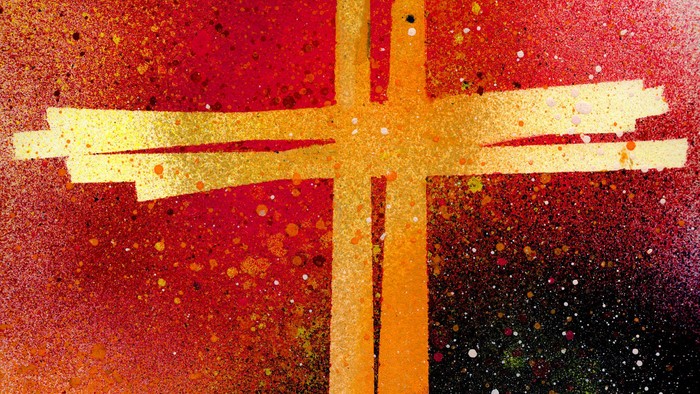 Ein leuchtend gelbes Kreuz vor einem roten und schwarzen Hintergrund