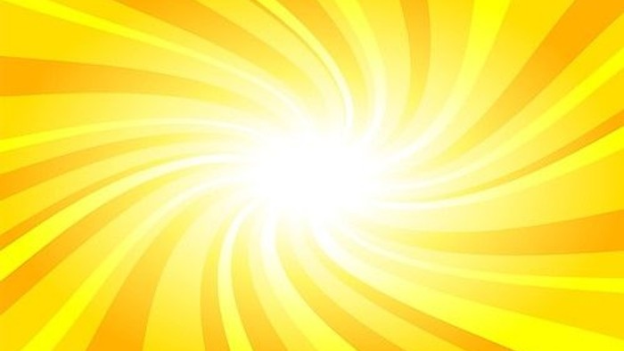 Das Bild zeigt eine strahlende, gelbe Spirale mit einem hellen Zentrum.