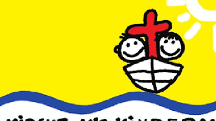 Ein lustiges Boot mit zwei Gesichtern und einem roten Kreuz auf gelbem Hintergrund mit der Aufschrift 