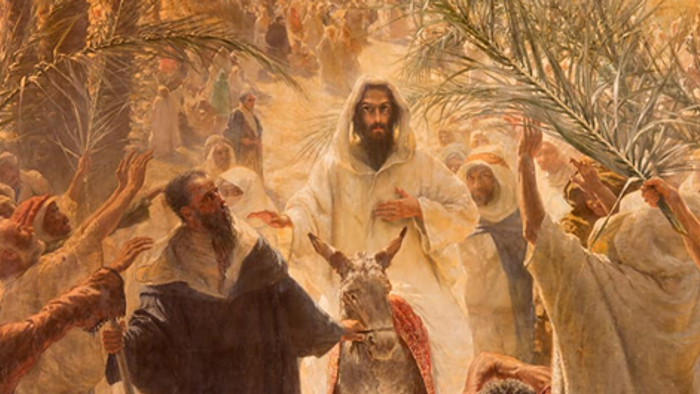 Religious painting depicts Jesus riding a donkey, surrounded by followers waving palm branches.