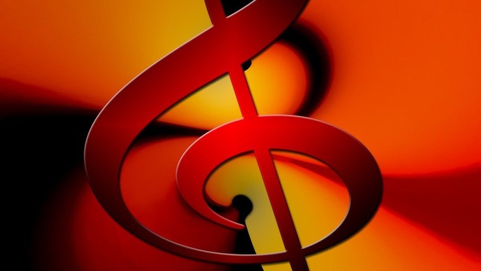 A close-up of a red treble clef symbol against an orange background.