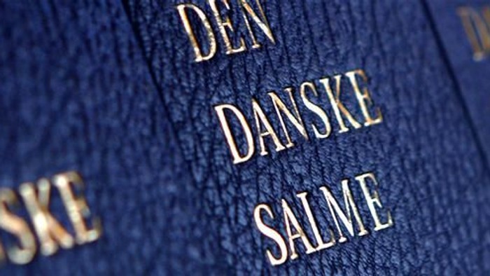 Blå bogdekk med guldtryk af 