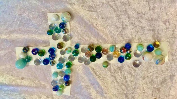 Murmelkreuz als Symbolbild