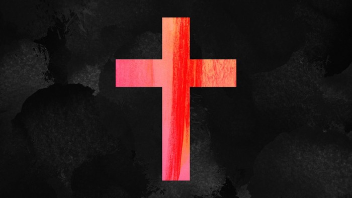 A red cross on a dark background