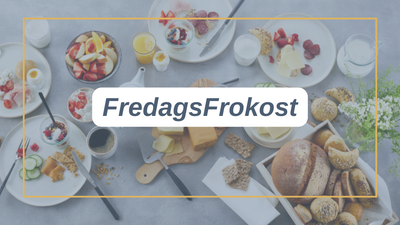 Farverigt morgenmadsbord med forskellige wienerbrød, frugter, brød og drikkevarer mærket "FredagsFrokost".