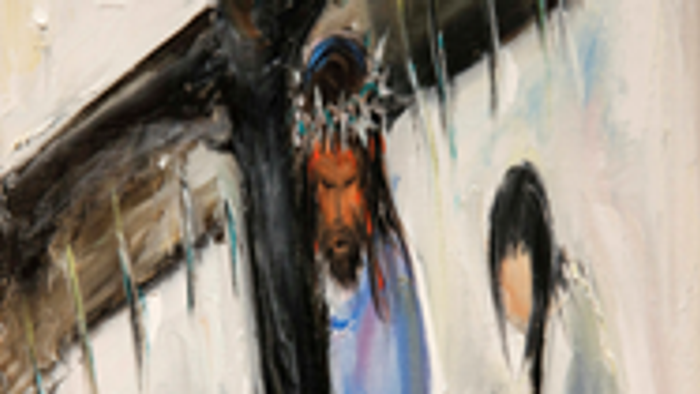 A painting of Jesus on the cross with three women below