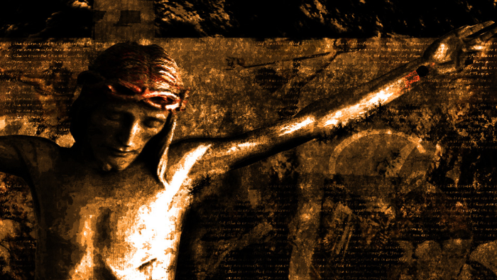 A close-up of a sculpted figure with outstretched arm, set against a textured background.