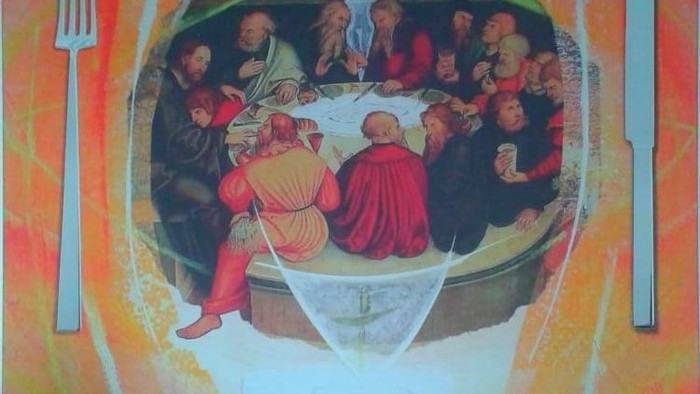 Das Bild zeigt eine surrealistische Darstellung eines Essens in einem Glas.