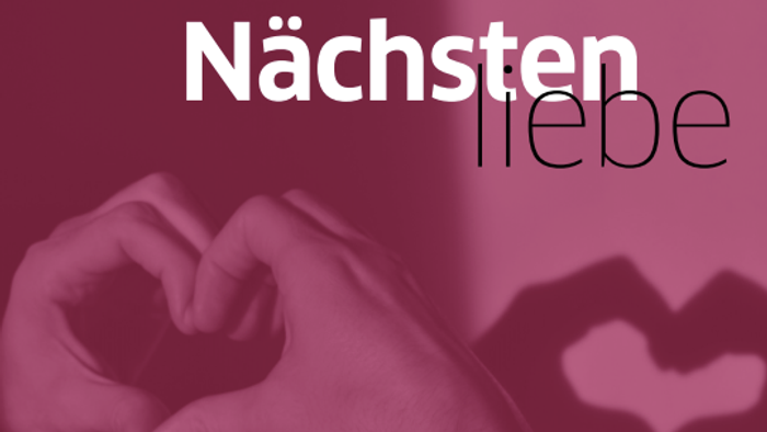 Ein Herz, das von Händen geformt wird, mit dem Text „Nächstenliebe“ im Hintergrund.