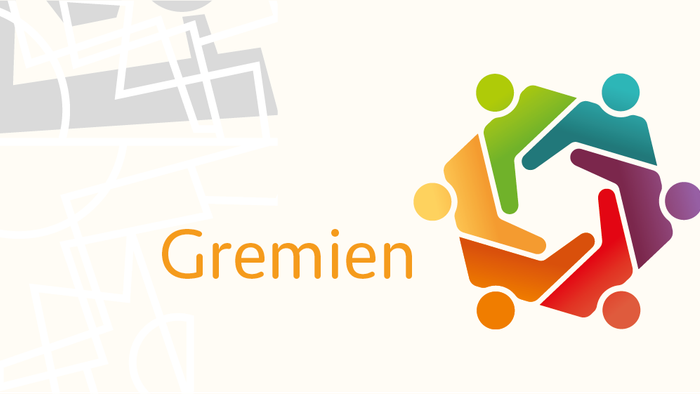 Das Bild zeigt das Logo der Stadt Gremien mit einem farbenfrohen Symbol für Einheit und Zusammenarbeit.