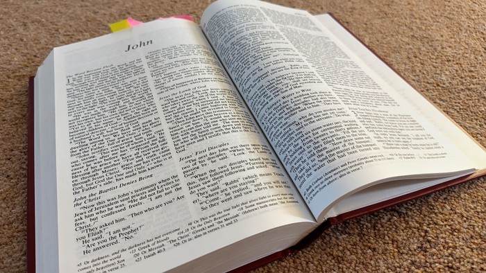 A bible open at the first page of John's gospel