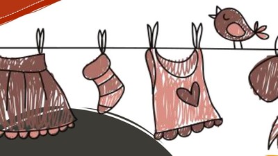 Kleidung, die an einer Leine trocknet, mit einem Vogel und herzförmigen Motiven.