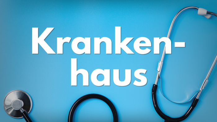 Das Bild zeigt einen blauen Hintergrund mit dem Wort „Krankenhaus“ und zwei Stethoskopen, die ein Krankenhaus symbolisieren.