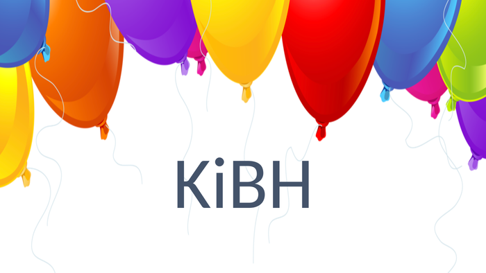 Billedet viser en festlig udsmykning med farvede balloner og teksten 