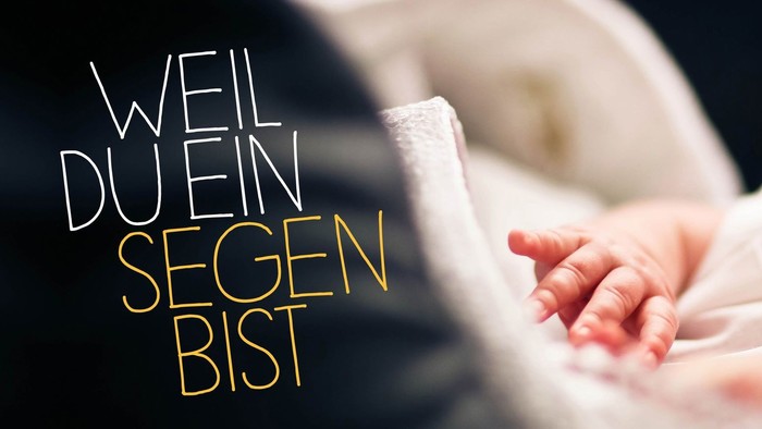 Ein Baby hält die Hand einer Erwachsenen, Text: