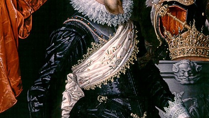 Portræt af en skægget mand i udsmykket kongeligt antræk fra det 17. århundrede, der holder et scepter og en krone.