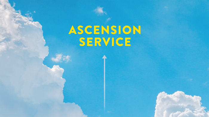 Ascension service sign against blue sky with clouds
