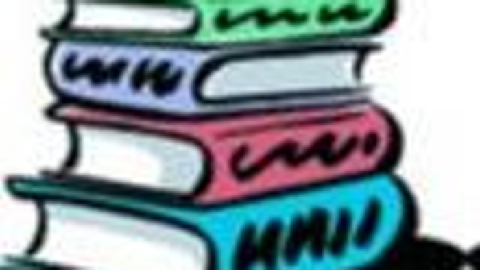 Bunter Bücherstapel, der Wissen, Lesen und Lernen symbolisiert.