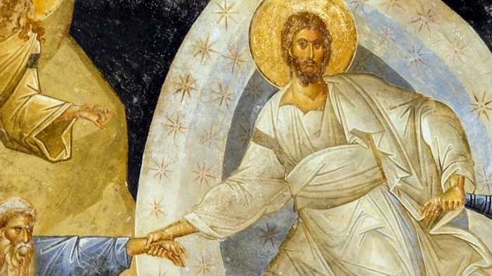 Byzantinsk-stil religiøs fresko, der forestiller Kristus, som velsigner en figur med gylden glorie og himmelske stjerner.