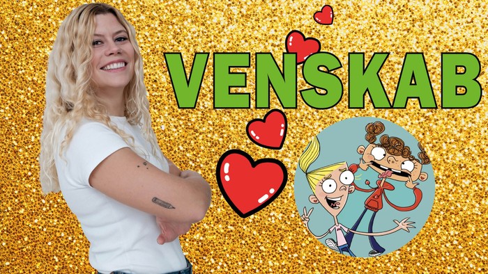 En glad kvinde poser med en konfettibaggrund, hvor der fejres