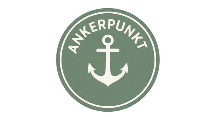 Logo mit einem Ankersymbol in einem grünen Kreis und der Aufschrift „ANKERPUNKT“ darüber.