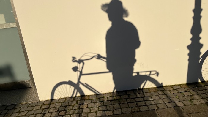 Schatten eines Fahrradfahrers