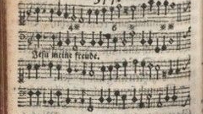 Historische Notenblätter mit deutschen Liedtexten und musikalischer Notation aus der Barockzeit.