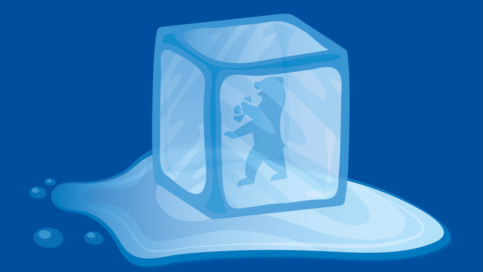 Das Bild zeigt eine Person in einem Eiswürfel, der schmilzt, mit Text in Deutsch