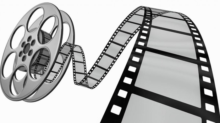 En filmrulle med filmbånd.