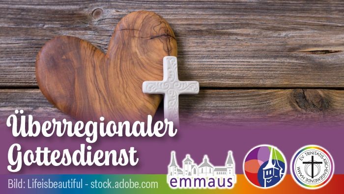 Holzherz mit Kreuz, das einen überregionalen ökumenischen Gottesdienst mit der Bezeichnung *„Überregionaler Gottesdienst“* und Emmaus-Logos symbolisiert.