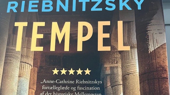 Bogomslag til *