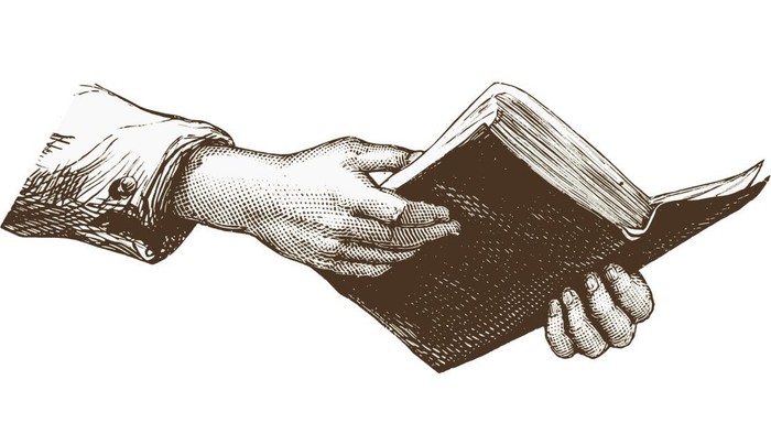 Eine Hand, die ein offenes Buch hält und den Akt des Lesens darstellt.