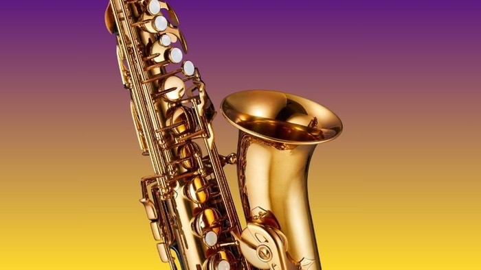 Teil eines Saxophons auf Hintergrund in gelb-lila