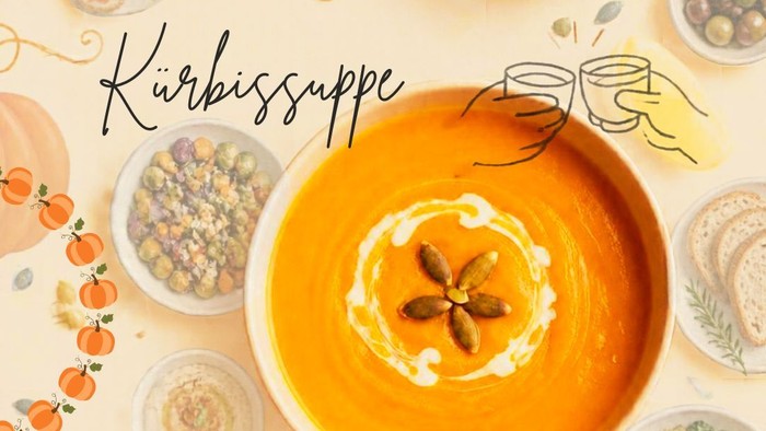 Farbenfrohe herbstlich inspirierte Kürbissuppe mit Garnituren und künstlerisch arrangierten Beilagen.