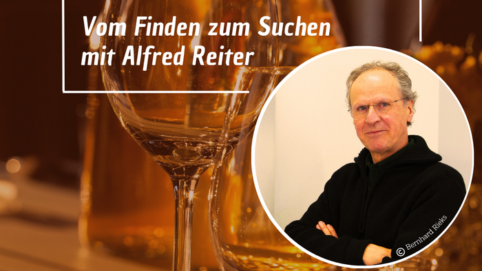 Plakat für einen deutschen Abendvortrag mit Alfred Reiter zum Thema „Vom Finden zum Suchen – ein Übergang“, inklusive Wein.