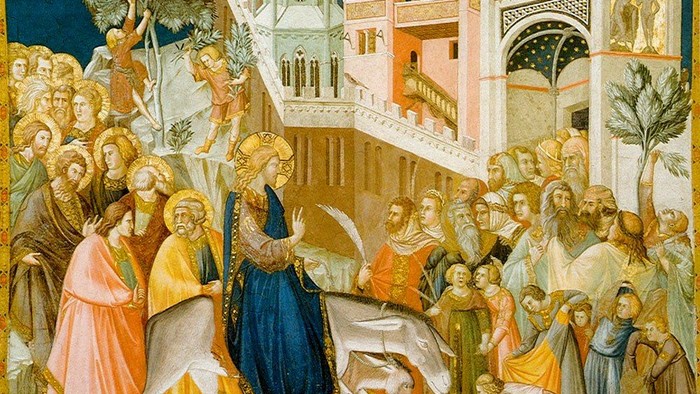 Billedet viser en religiøs scene med en stor gruppe af figurer foran et palads.