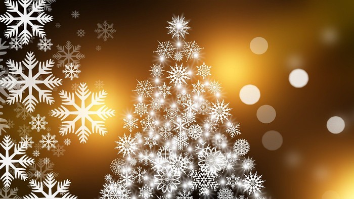 Weihnachtliche Schneeflocken und warmes Licht
