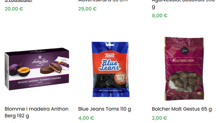Et screenshot fra en webshop, hvor der sælges danske julevarer. På billedet ses adventskranse, agurkesalat, chokolade og lakridser.