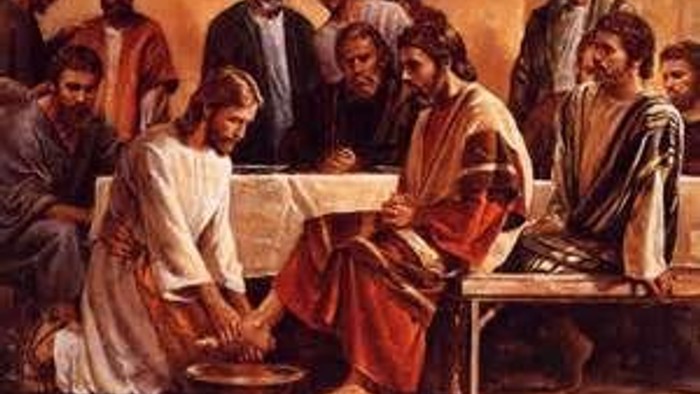 Jesus, der vasker disciplenes fødder under nadveren, som et billede på ydmyghed og tjeneste.