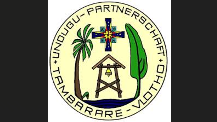 Das Bild zeigt das Wappen von Papua-Neuguinea mit Kokospalme, Boot und Kreuz.