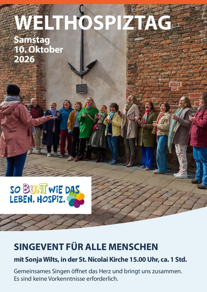 Ein Chor vor dem Anker der St. Nicolai-Kirche