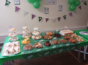 A delicious spread of cakes, savories and sandwiches raised £300 for Macmillan Cancer Support A delicious spread of cakes, savories and sandwiches raised £300 for Macmillan Cancer Support