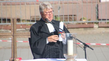 mit Taufkerze mit Taufkerze