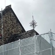 Das schmiedeeiserne Dachkreuz